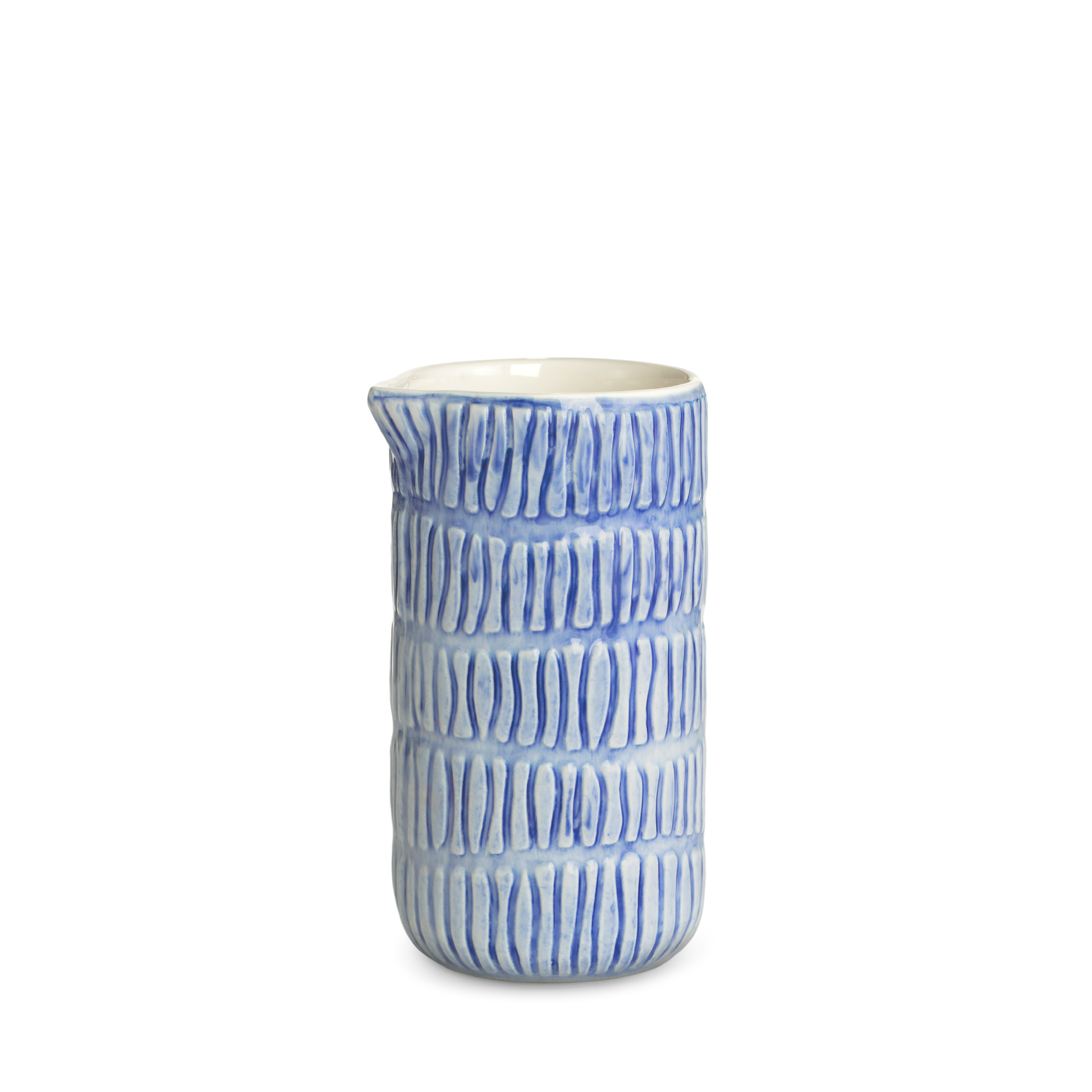 Ceramic jug with blue pattern on a white background