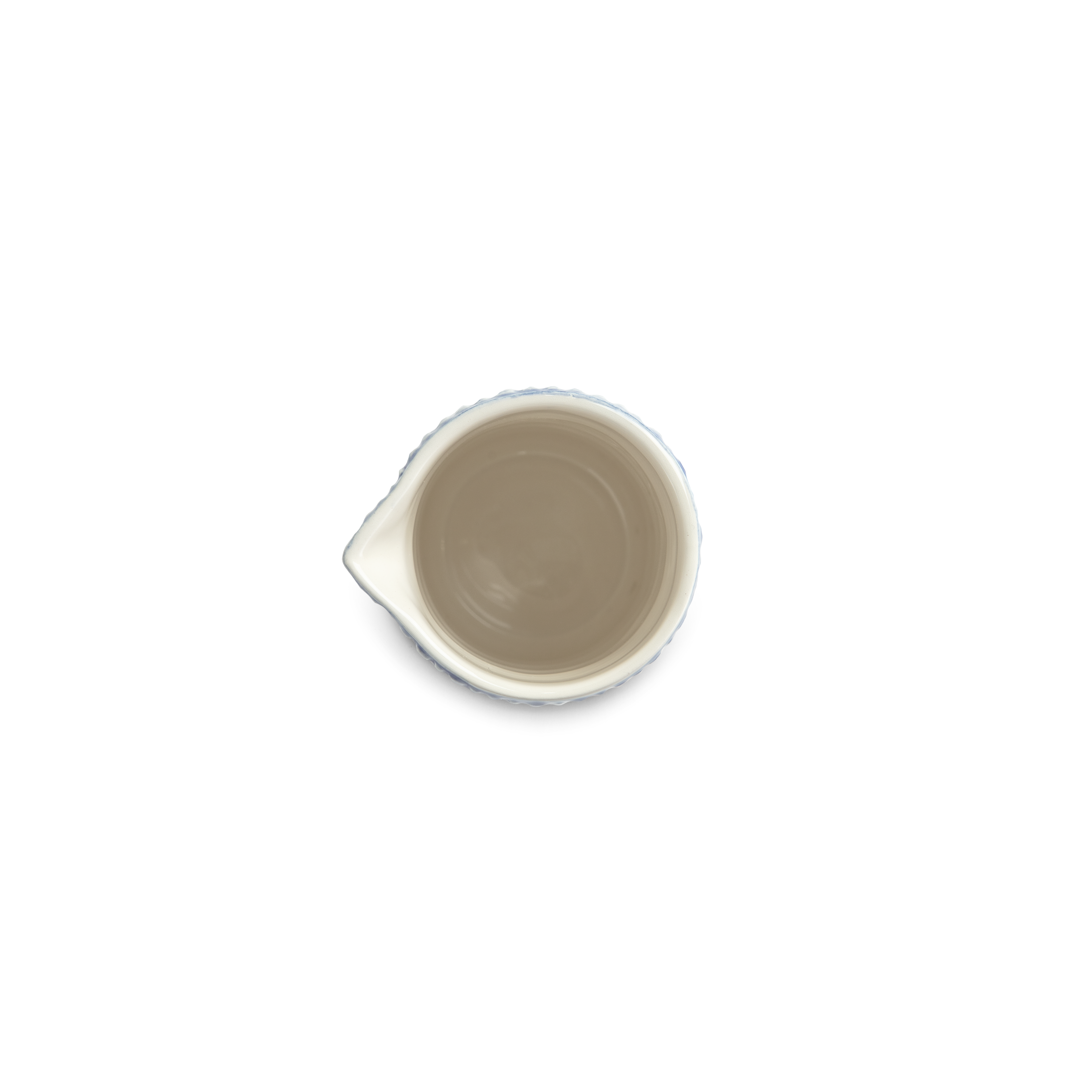 Small ceramic jug on a white background from above
