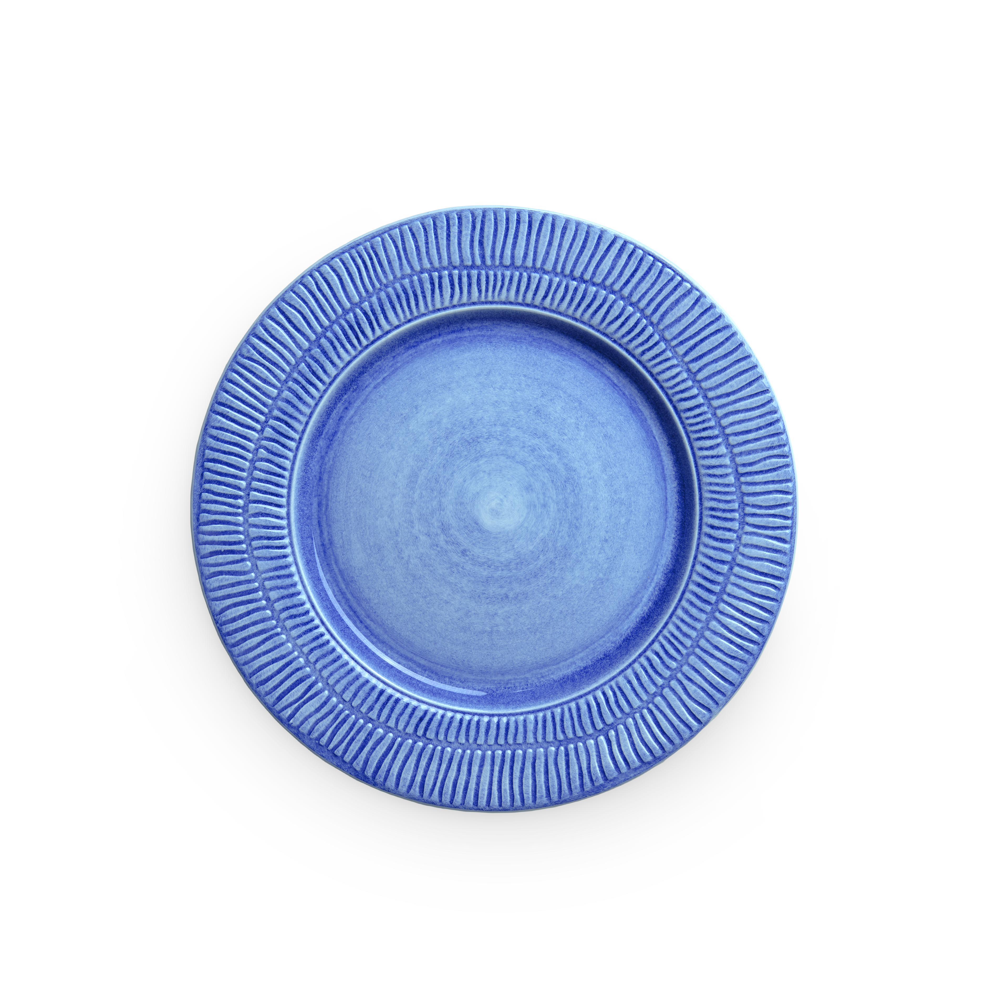 Blue ceramic plate with textured rim on a white background