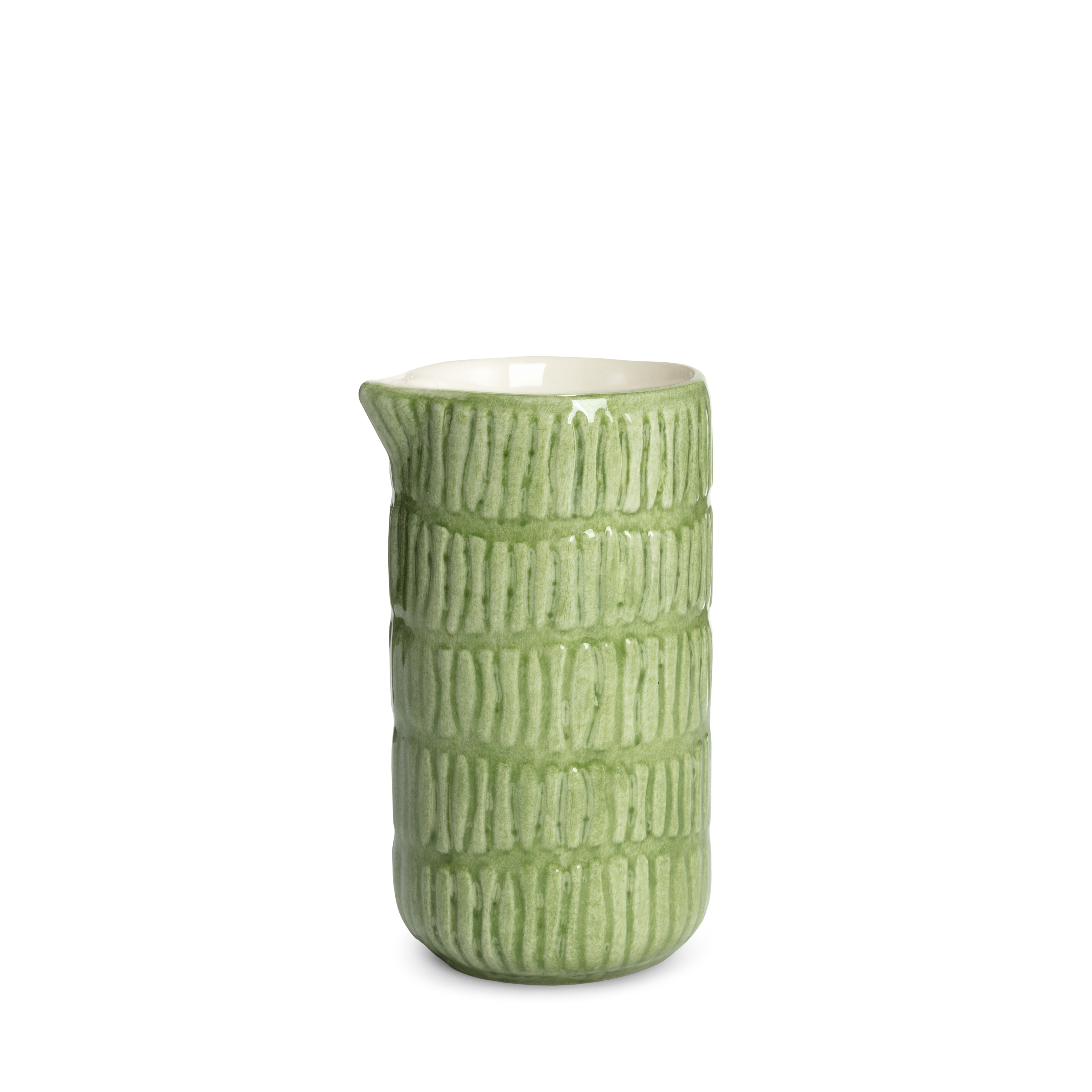 Green ceramic jug with textured design on a white background