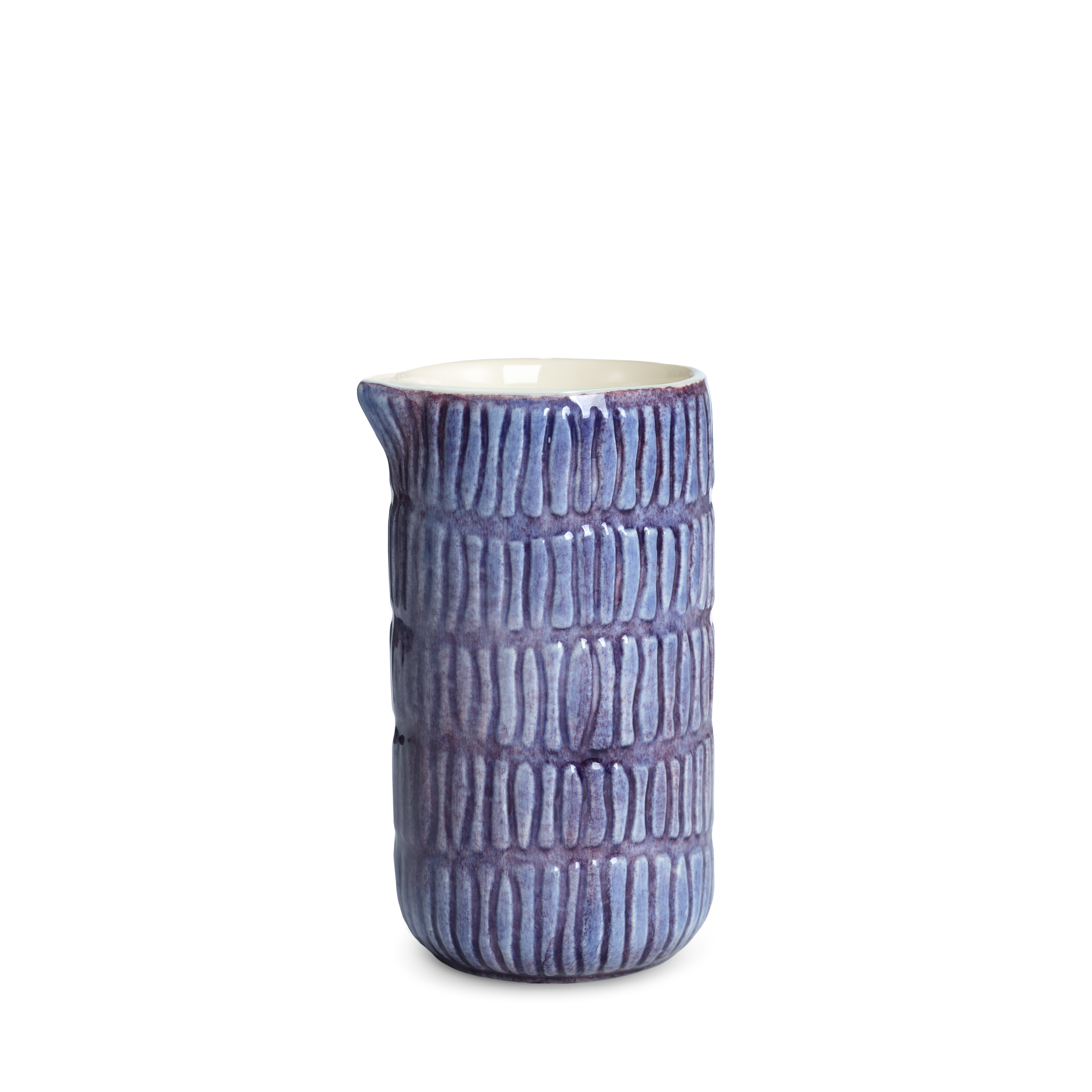 Purple ceramic jug with textured surface on a white background