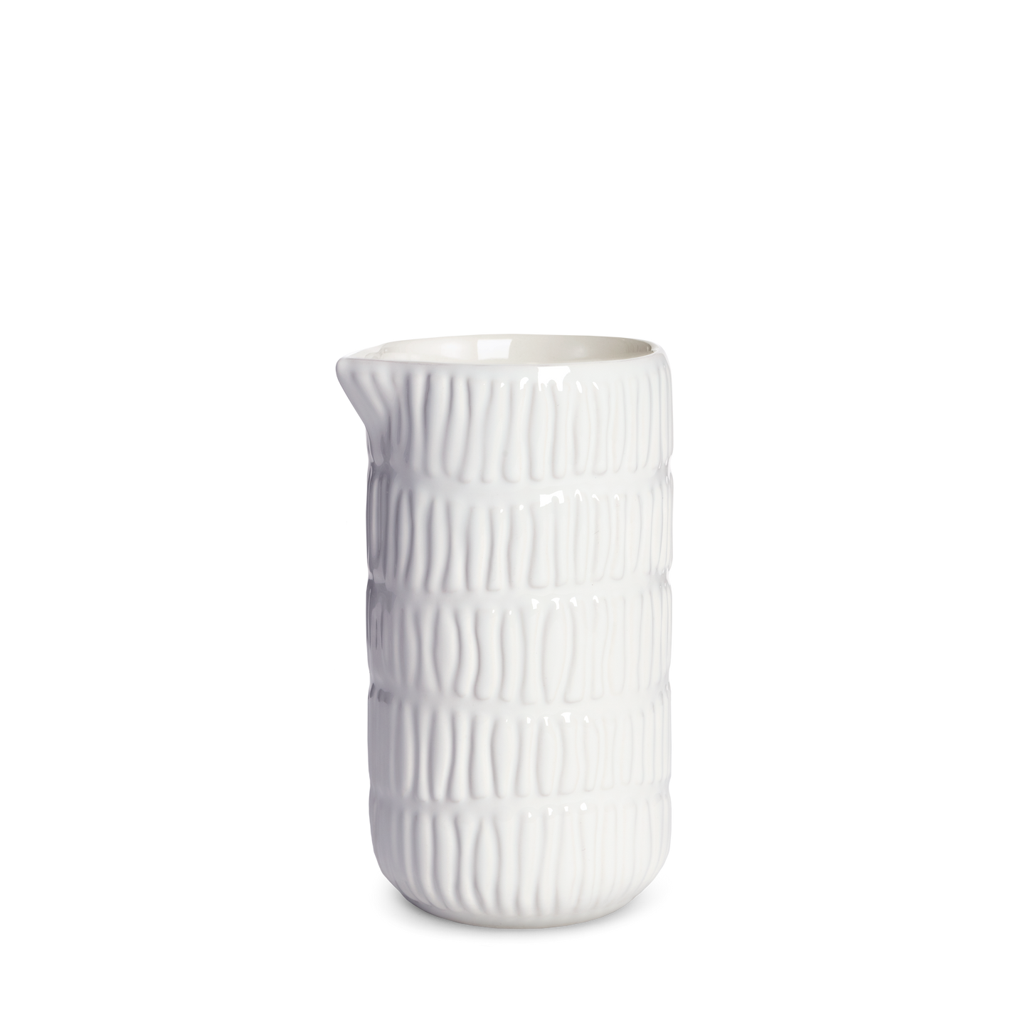 White ceramic jug with textured surface on a white background