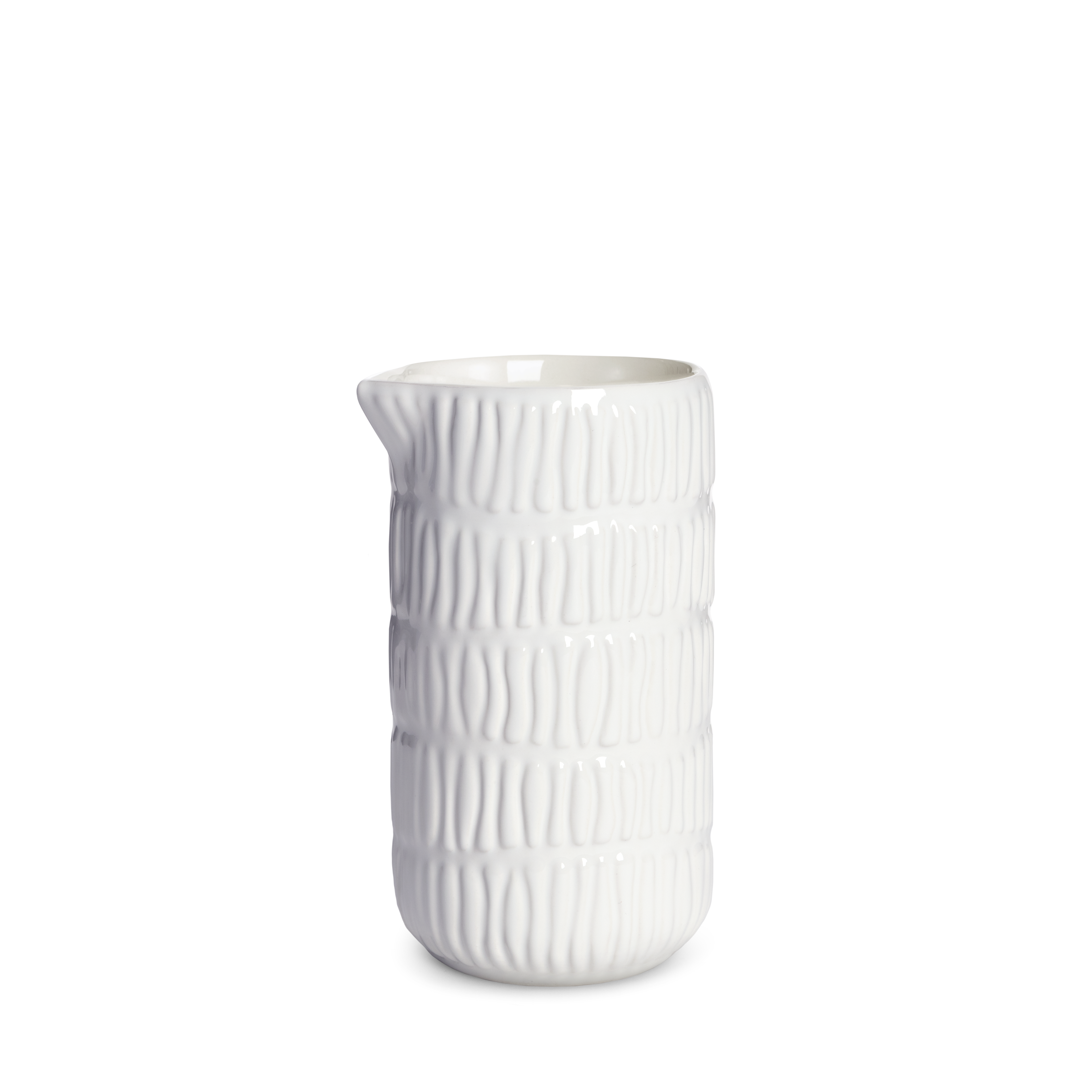 White ceramic jug with textured surface on a white background