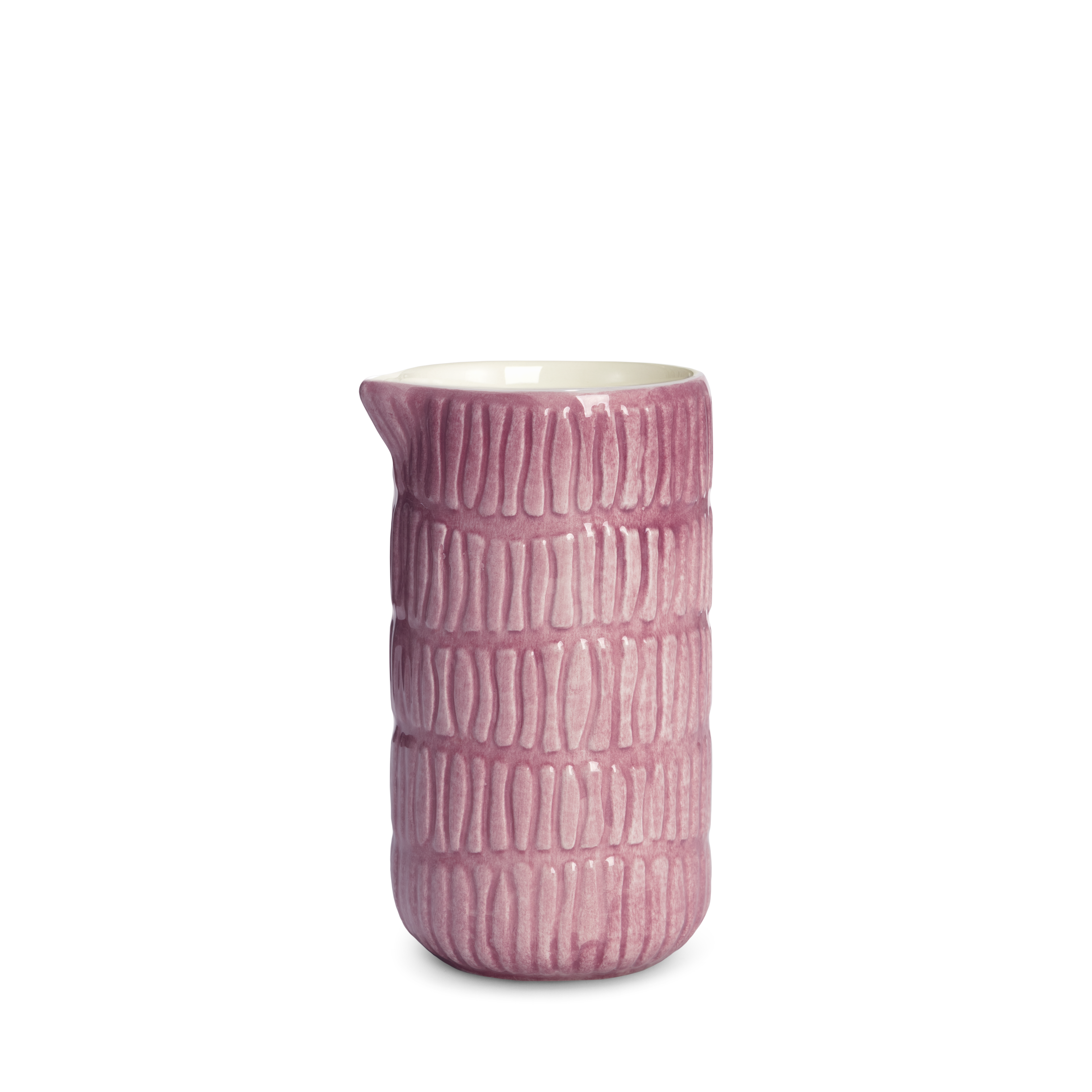 Pink textured ceramic jug on a white background