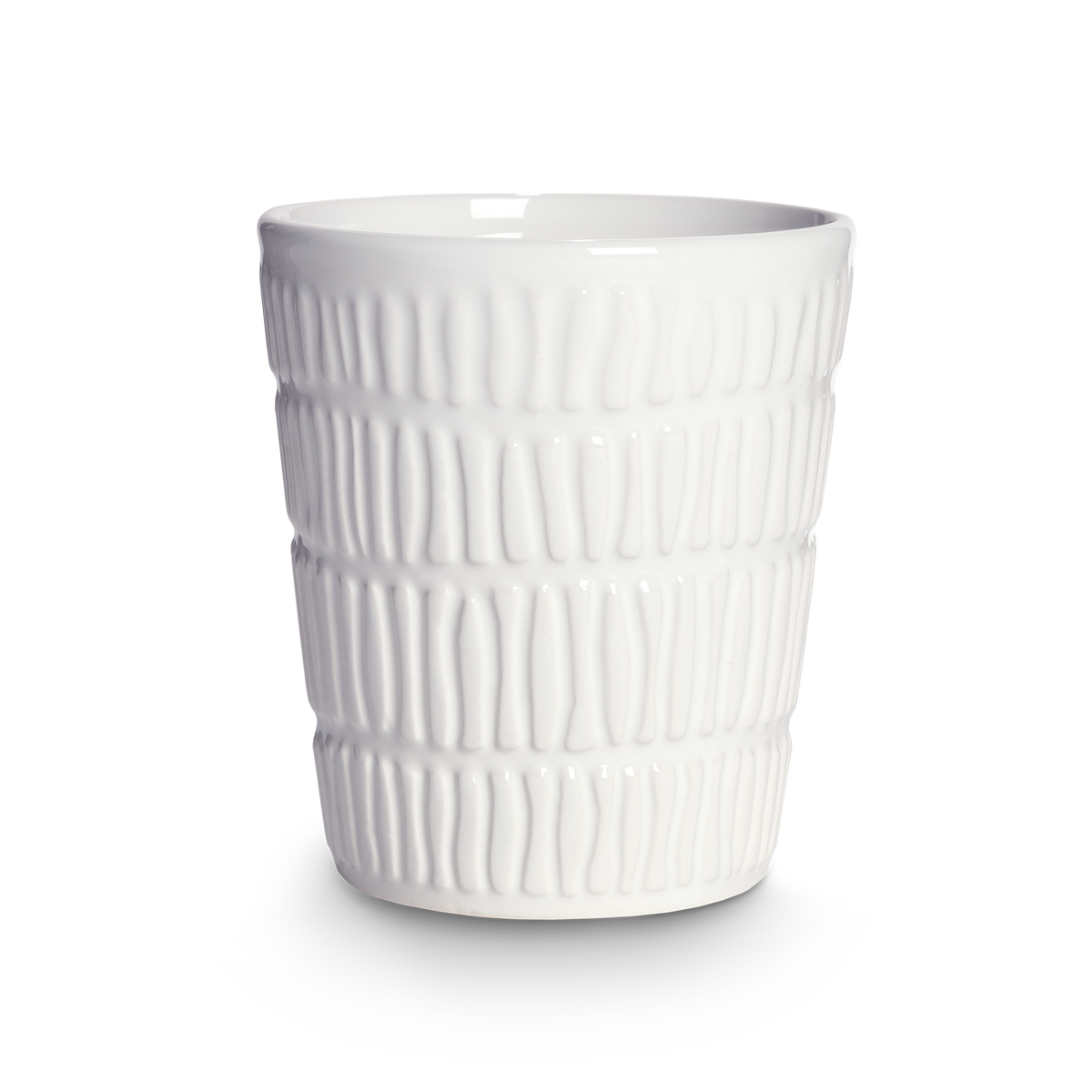 White textured ceramic cup on a white background