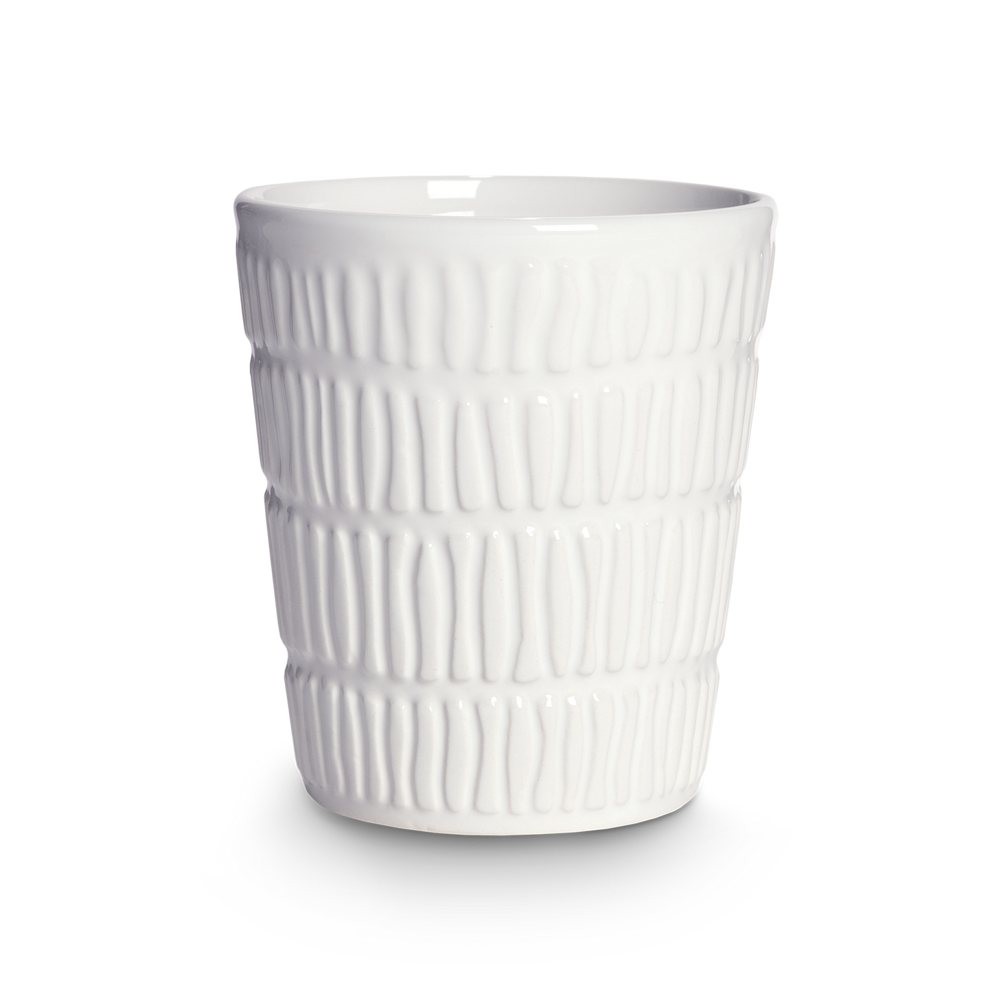 White textured ceramic cup on a white background