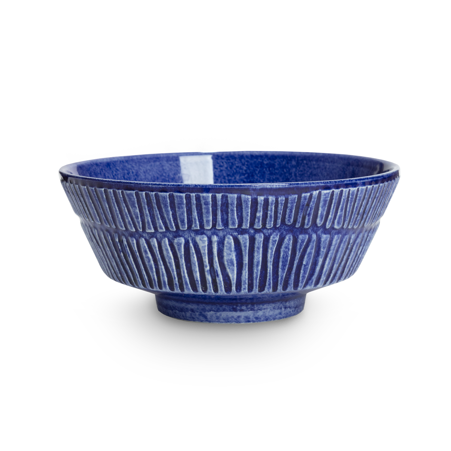 Blue ceramic bowl with textured design on a white background