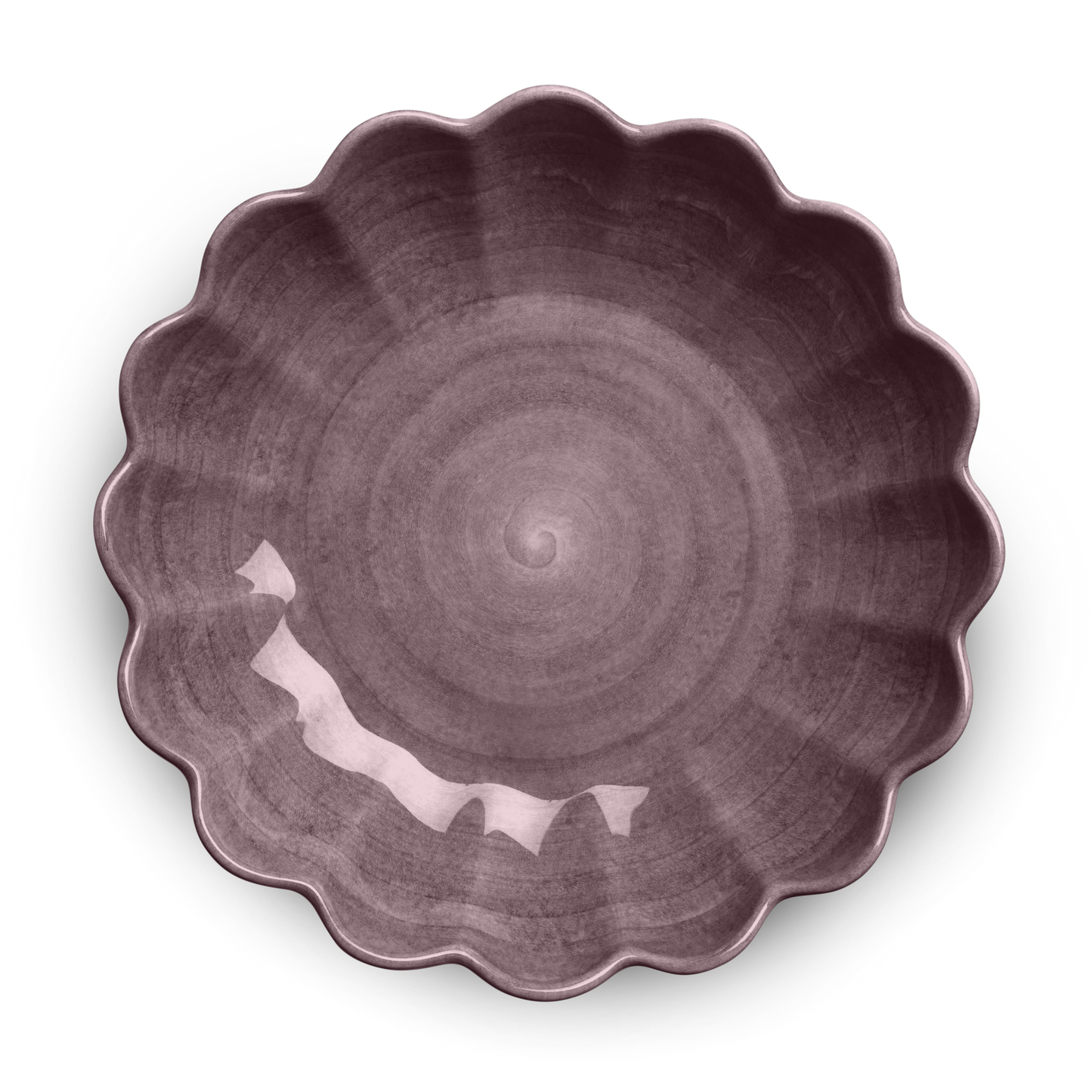 Purple ceramic plate with scalloped edge on a white background