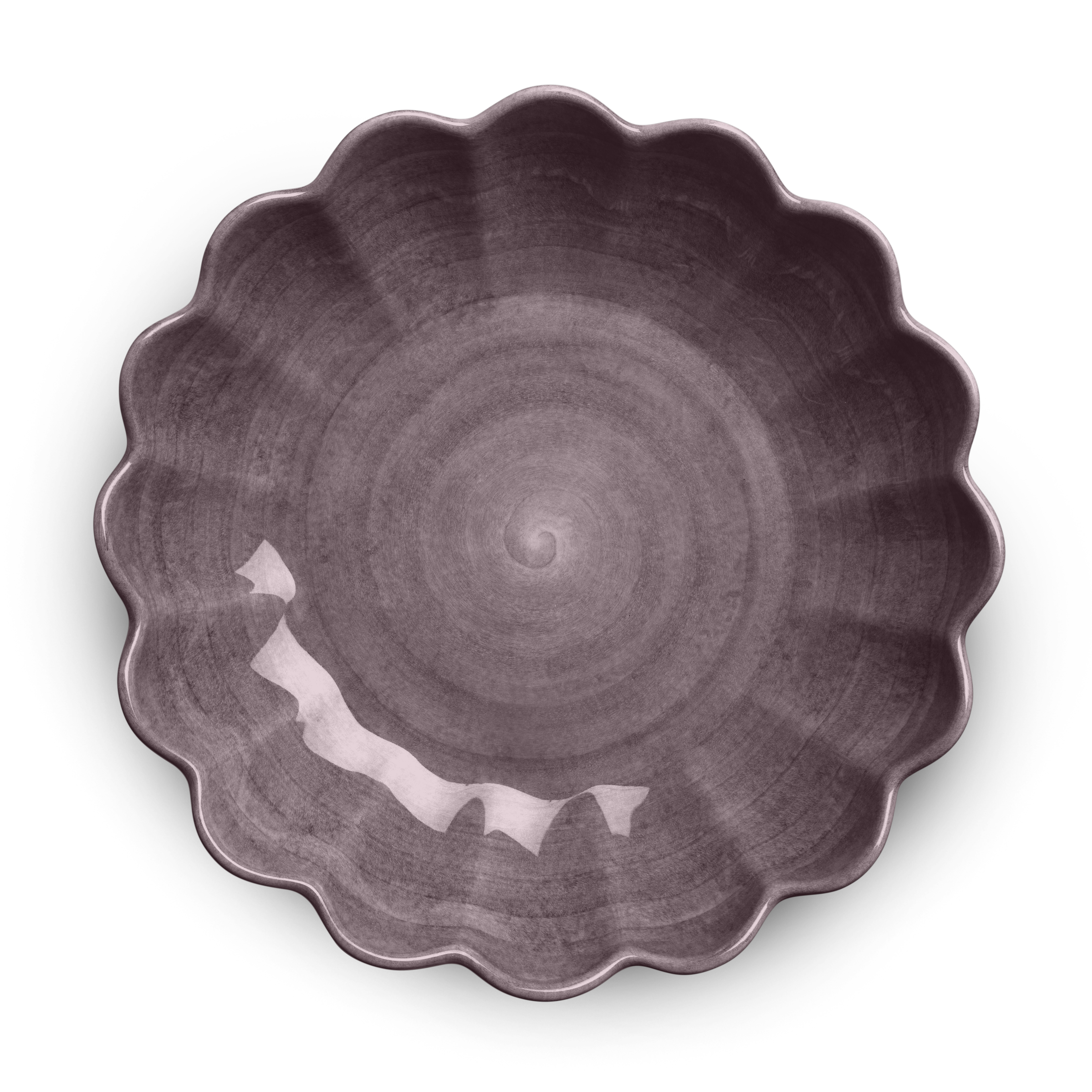 Purple ceramic plate with scalloped edge on a white background