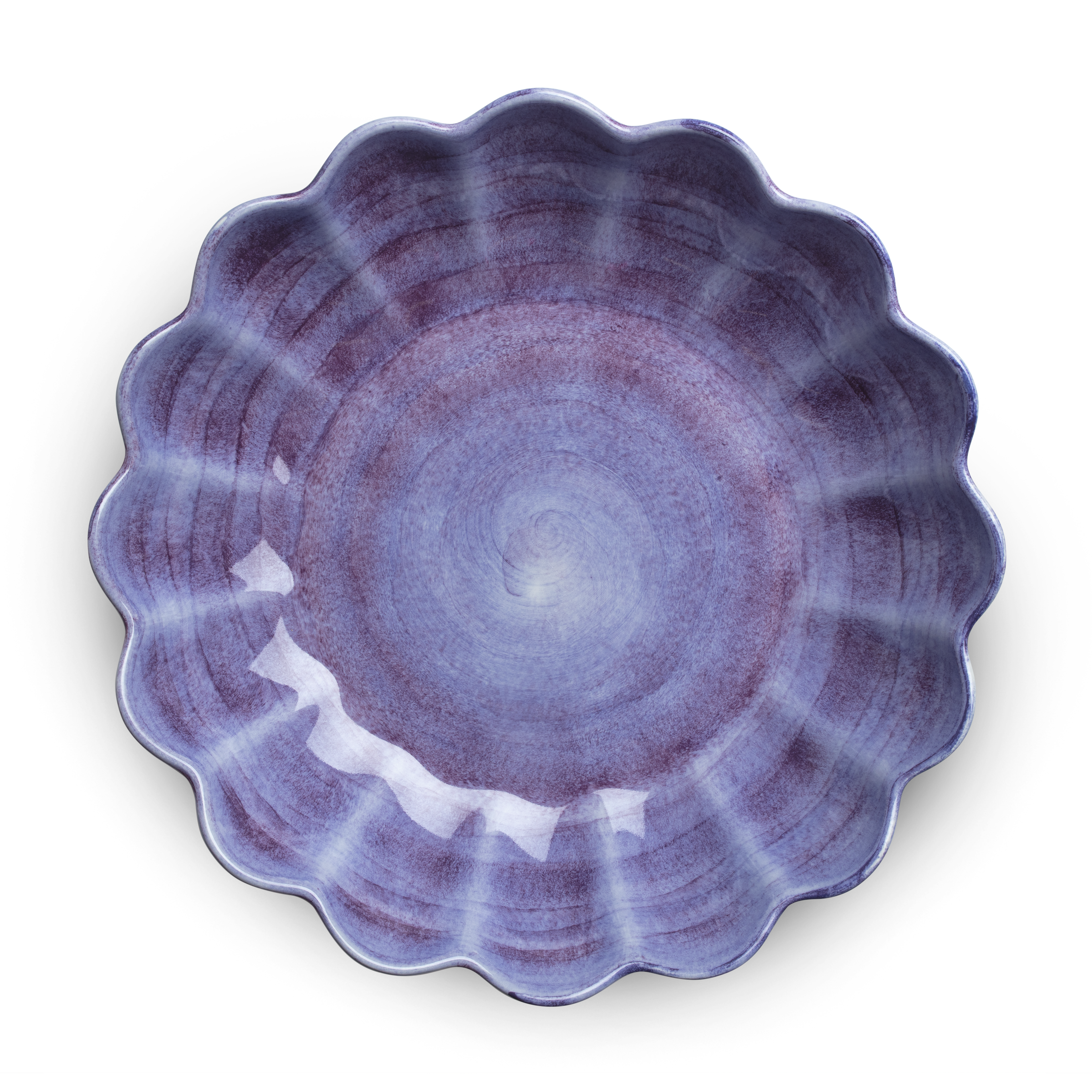 Decorative purple ceramic plate with scalloped edge on a white background