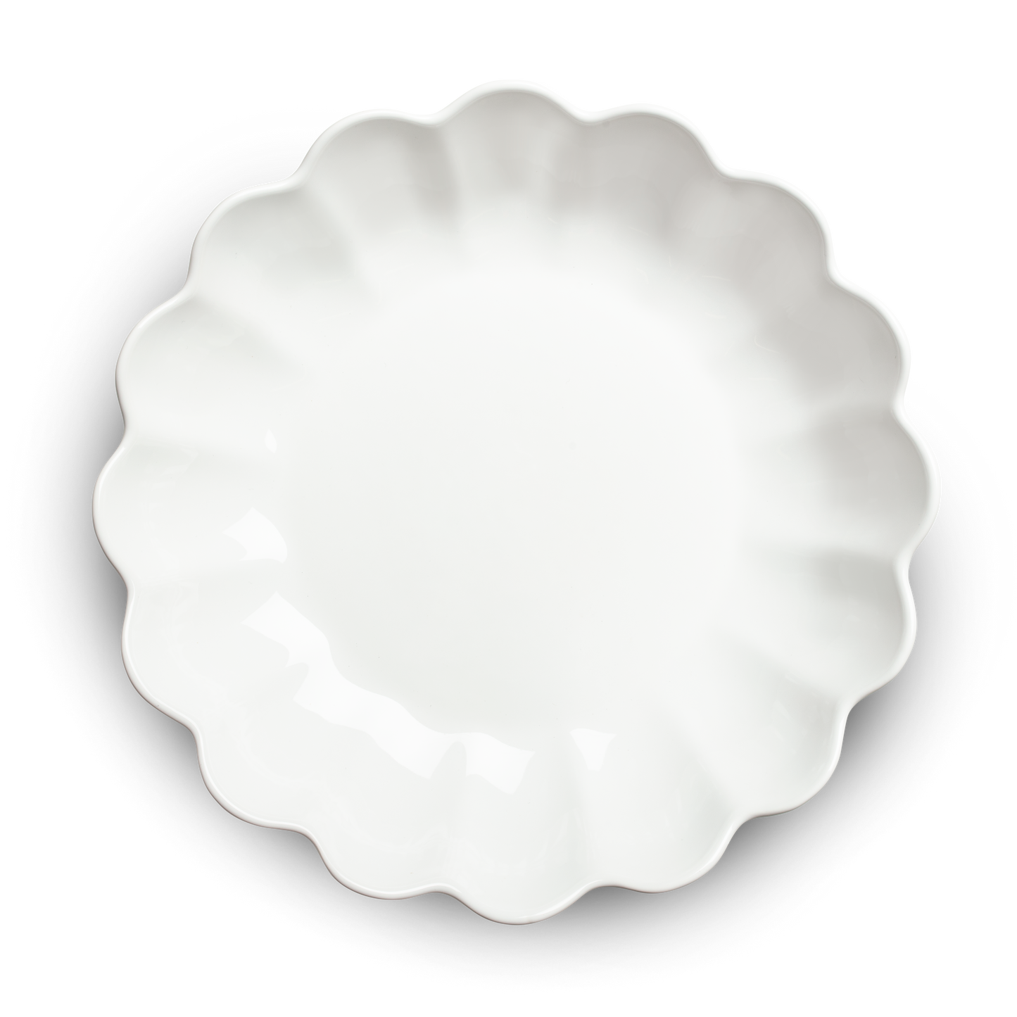 White ceramic pie dish with scalloped edge on a white background