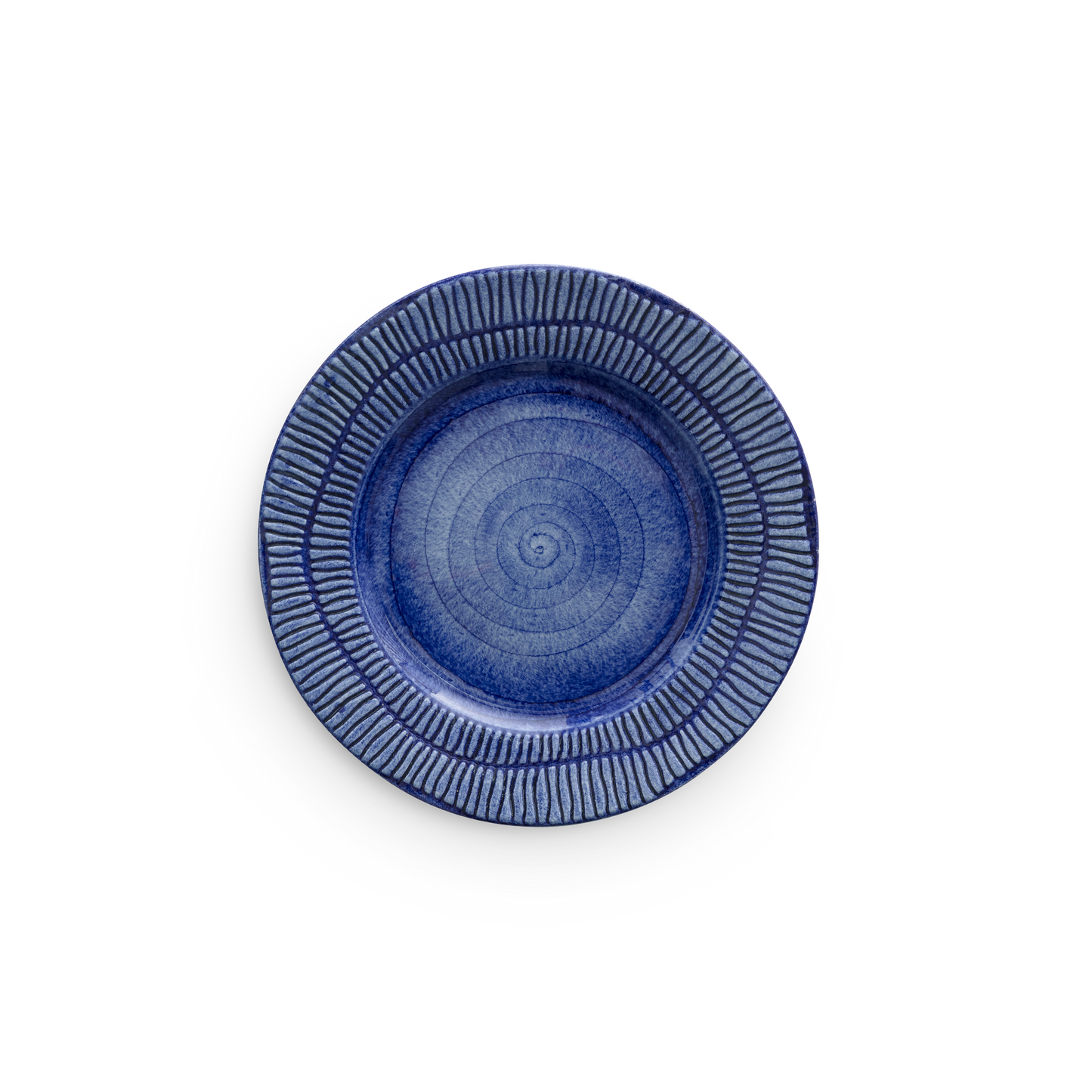 Blue ceramic plate with textured rim on a white background