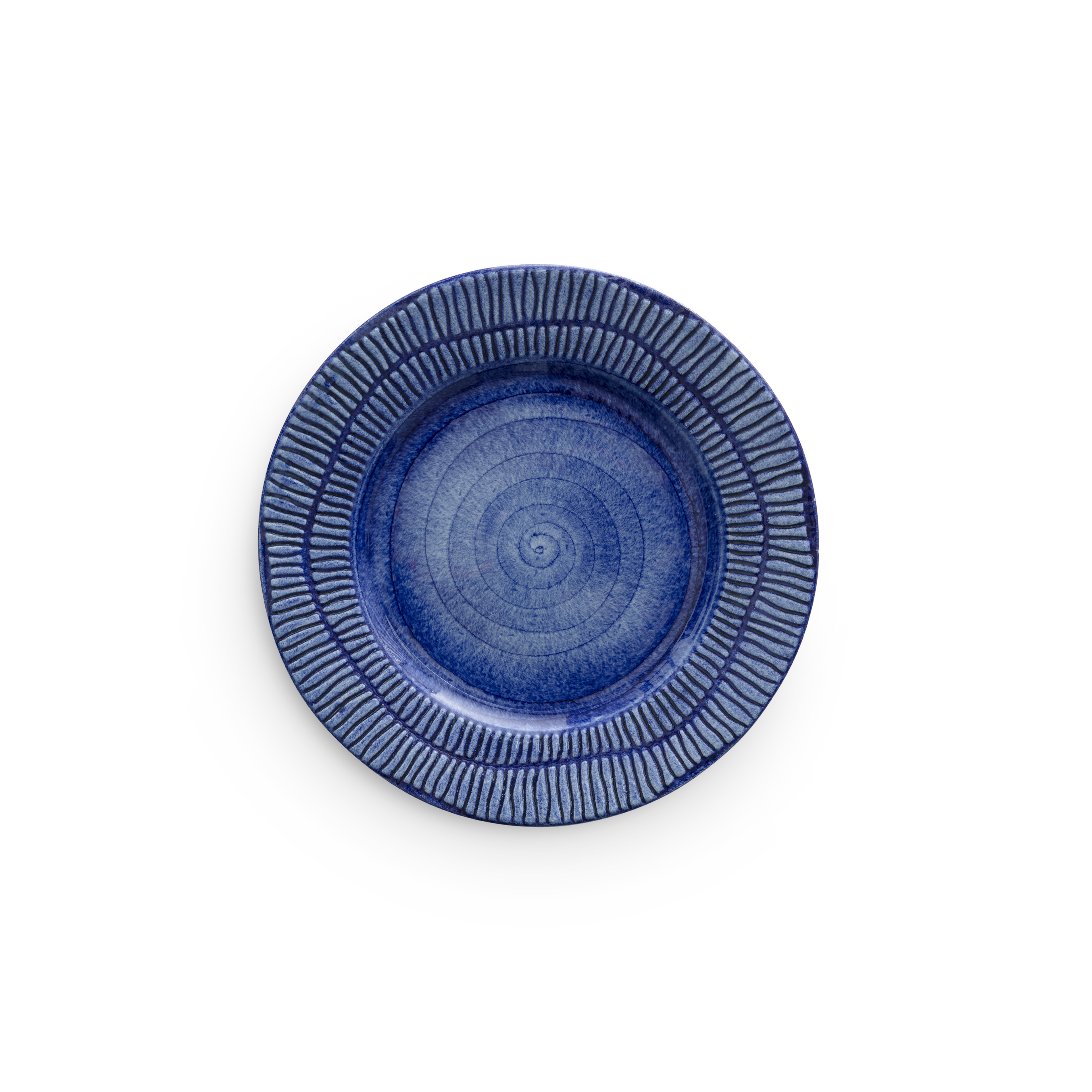 Blue ceramic plate with textured rim on a white background